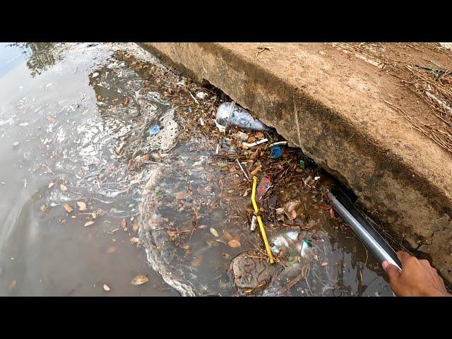 Draining a Flooded Street Rain Drain Unclogging