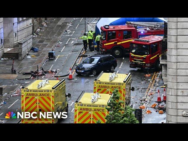Driver detained after car drives into crowd at Liverpool parade