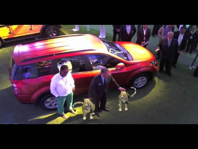 Anand Mahindra tames two cheetahs at the Auto Expo 2014!