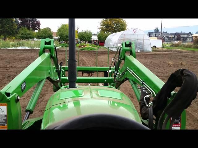 John Deere 4066R with 665 Tiller