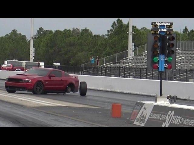 Mustang GT Loses Control Drag Racing BMW M5 - Road Test TV ®