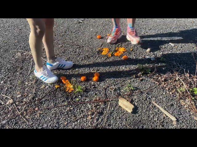 Hot girls tramping food crushing stomping sneakers