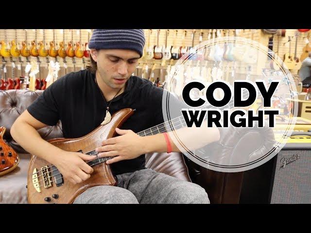 Cody Wright playing a Alembic Bass at Norman's Rare Guitars