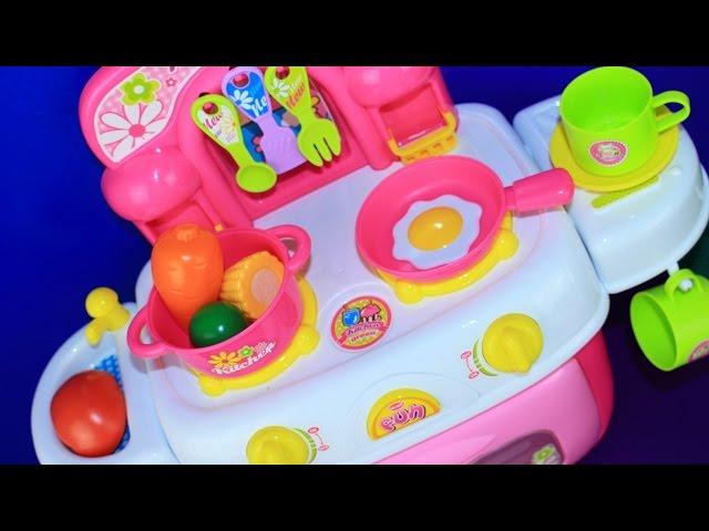 Cooking with toy kitchen and velcro cutting fruits and vegetables