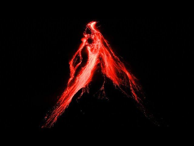 Lava from Mayon Volcano lights up night sky