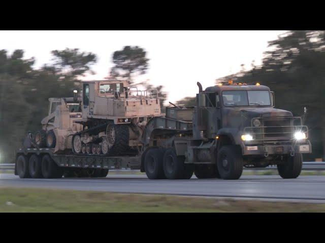 Army trucks on the move, and flooding continues after Hurricane Milton