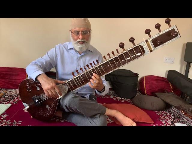 Playing Krintan on Sitar 3/8