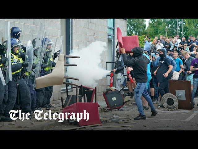 Anti-immigration protesters smash through migrant hotel in Rotherham