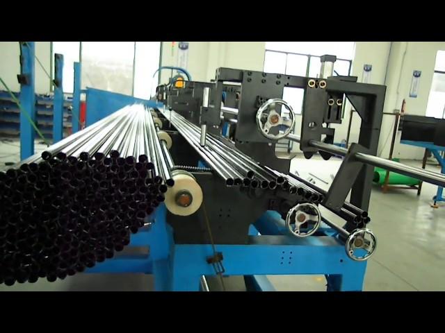 Fully automatic metal pipe and tube cutting machine with auto loading roller tables