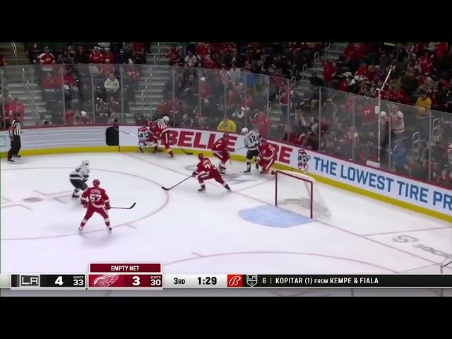 Larkin sprawls out to save an empty net goal