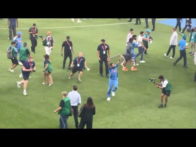 Virat Kohli bhangra dance with Stump for Anushka Sharma on ground after India won Champions Trophy