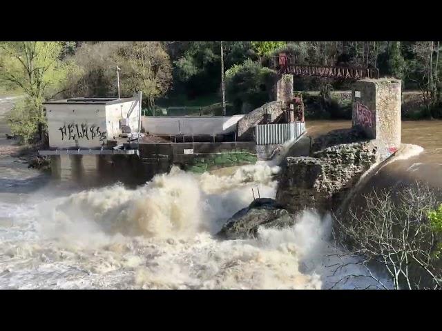 Water pouring over Dam while on Tournon, France Steam Train