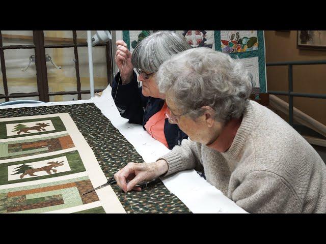 The Fabric Of Friendship: Old Forge's Pointed Pine Quilters Join Hearts, Hands, And Fabric