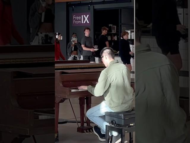 Pianist summons orchestra in cafeteria (Shostakovich waltz 2 flash mob)