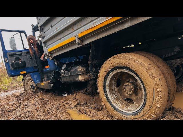 CAR STUCK || Stuck on a truck in the mud trying to turn around.  High heels boots in mud