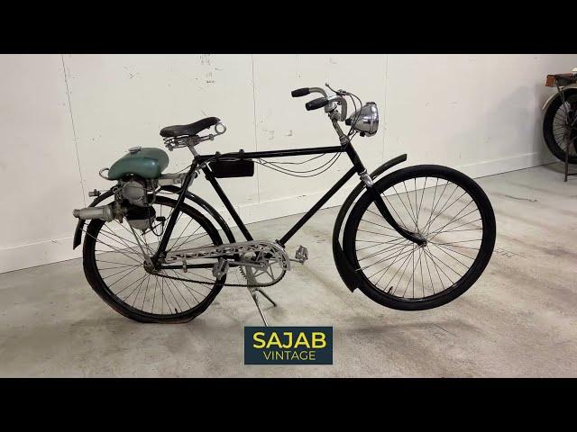 Pedal bike with outboard motor, Wico "Power Pak", mid 20th century