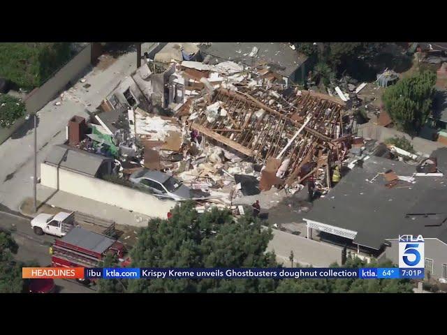 At least one injured after house explodes in Long Beach