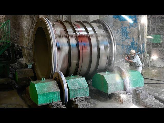 Process of making giant concrete pipes. A factory in Japan uses centrifugal force to make the pipes.