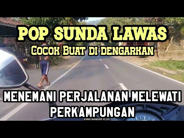 Lagu sunda merdu menemani perjalanan melewati pemandangan perkampungan dengan jalan bagus