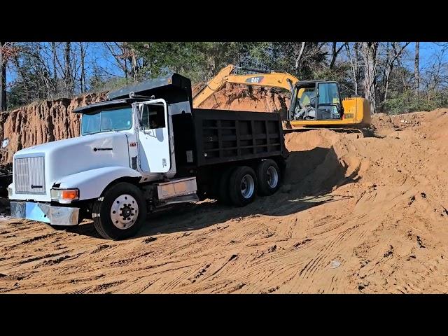 Mississippi Logging: Logger Doing Dump Truck Work On Christmas Eve