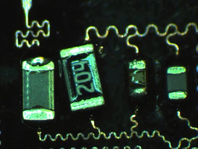 Self-alignment of surface mounted COTS chips