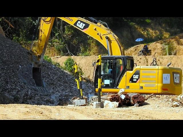 Excavator Drilling Rig Building A Winding Road On The Steep Slope