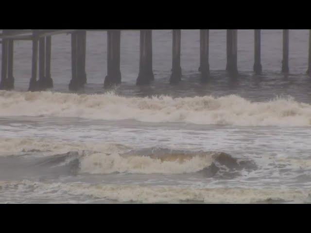 Why does the water look dirty, brown in Pacific Beach?