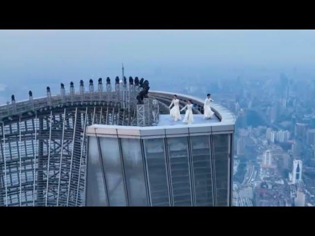 Tai chi masters practice atop China's skyscrapers for Spring Festival Gala show