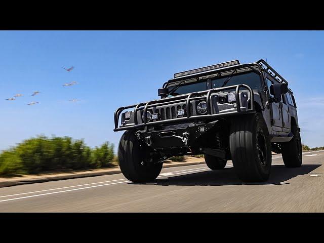 PREDATOR INC'S 6 PASSENGER HUMMER H1