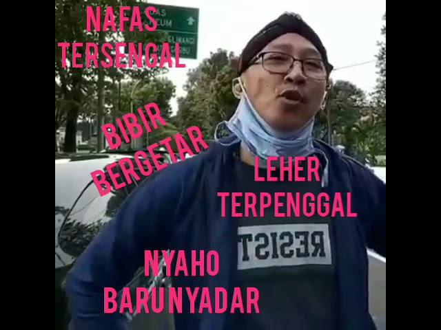 ABU TOMANG NANTANG DI PENGGAL KEPALANYA