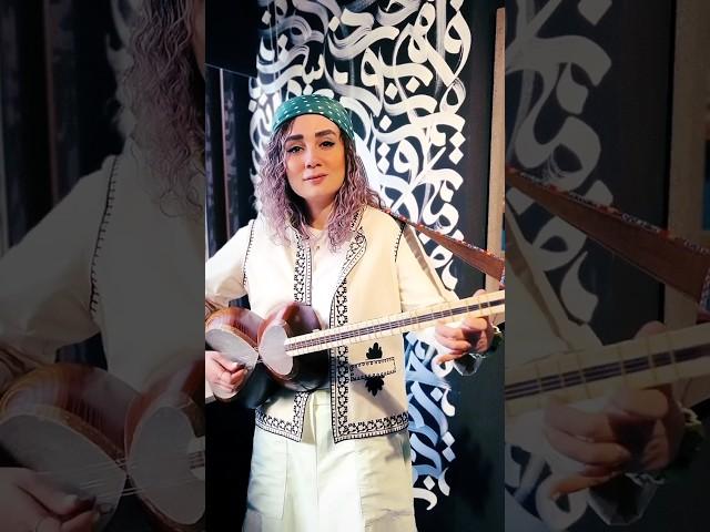 Iranian Woman Plays Traditional Stringed Instrument Beautifully