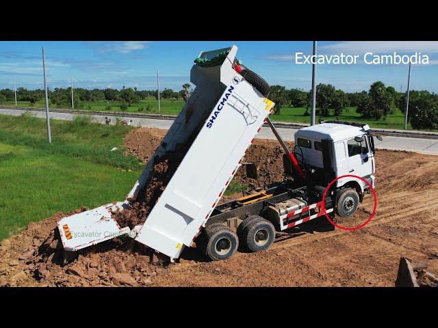 Best Action New Dump Truck Pouring Soil Filling Up And Old Bulldozer Pushing Soil To Slope