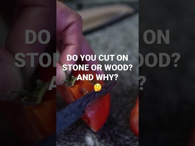 I cut on stone despite dulling faster because the wood can swell, mold, and retain bacteria.