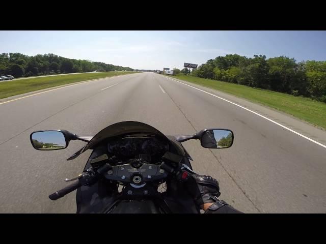 CROTCH ROCKET OVERTAKES 6 CARS @150MPH...ONE TRIES TO BLOCK!!!