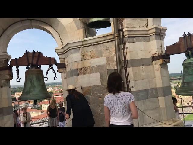 Ringing bells at the top of the leaning tower of Pisa