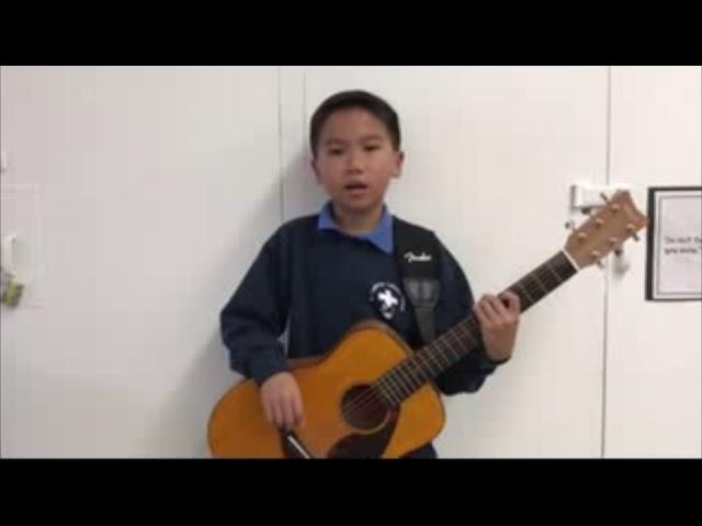 Young guitarist from the Arts Alive program.