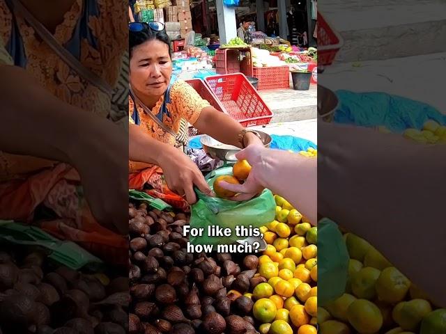 Friendly Market Vendor in Sumatra, Indonesia 