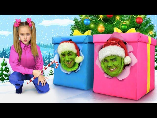 Sasha bakes Gingerbread Houses and gets Grinch Presents on Christmas