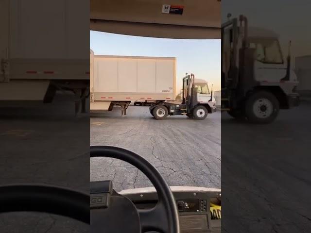 Yard Driver backing up Trailer