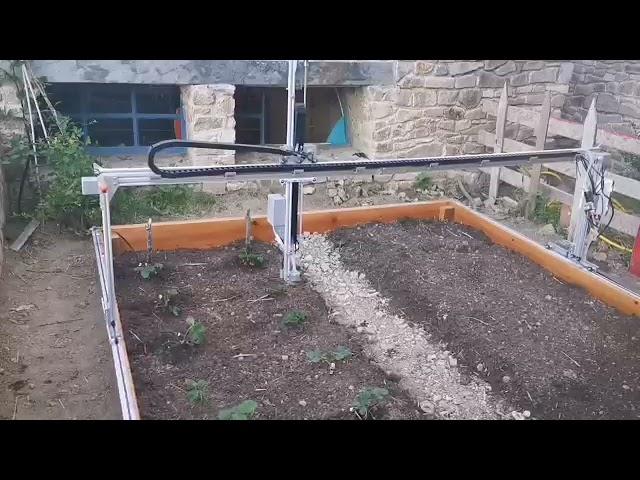 Trying new gardening robot at the Catfarm