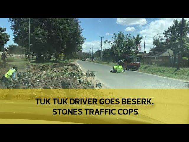 Tuk Tuk driver goes berserk, stones traffic cops