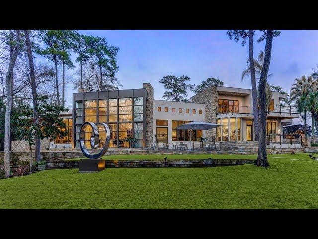 $6,950,000! Masterpiece of modern design in Houston with dramatically landscaped grounds