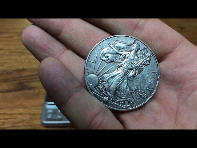 How much does a uncirculated American Silver eagle weigh vs my pocket coin American Silver Eagle?