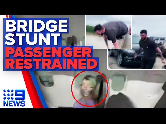 Man jumps of bridge to avoid traffic, plane passenger restrained with duct tape | 9 News Australia