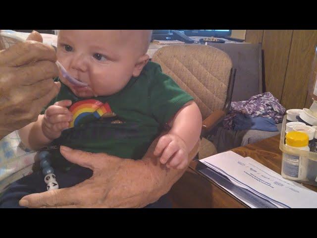 gage's  first time using a spoon