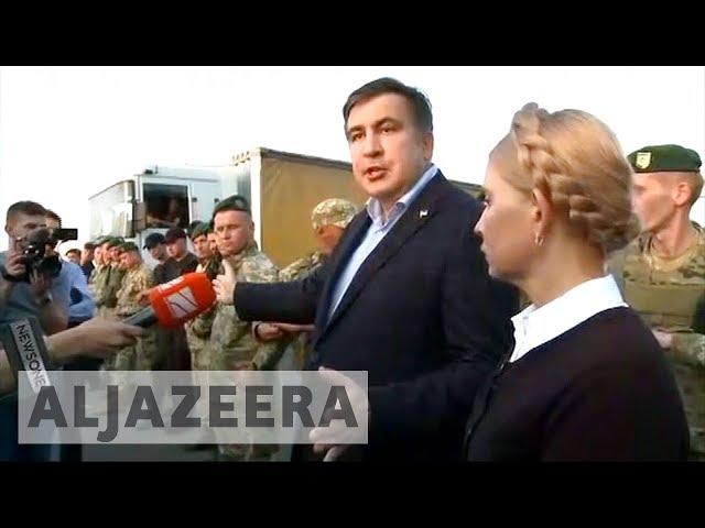 Ex-Georgian leader Mikhail Saakashvili forces his way into Ukraine