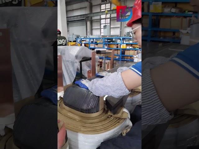 Assembling the Upper Yoke with Silicon Steel Laminations
