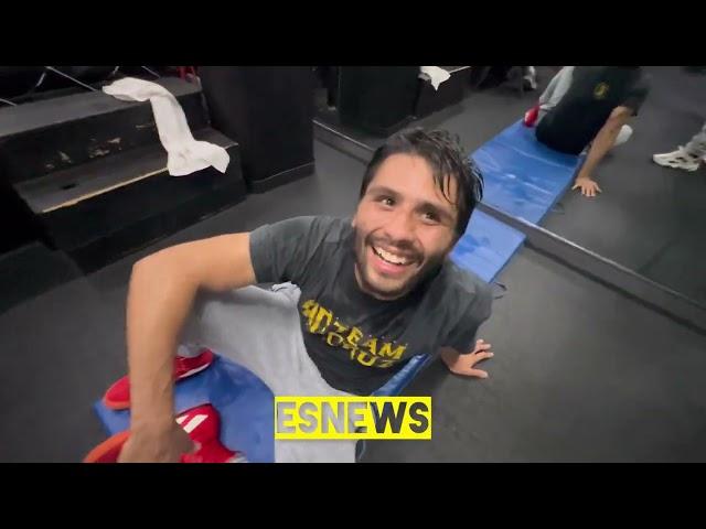 Ron Cruz working on talking a nasty body shot EsNews Boxing