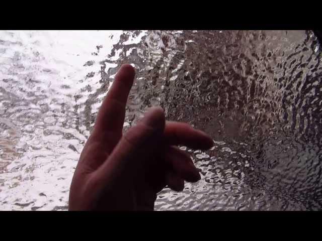 Ice storm. Smashing the car window.