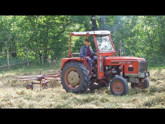 Classic Zetor 4911 turning hay in south west France 20 years ago with Kuhn single rotor Gyrorake